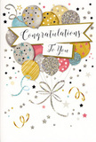 This congratulations card presents a cheerful, sophisticated celebration scene, much like the feeling of walking past a festively decorated home near Herne Hill station after good news. At its centre, a lush cluster of illustrated balloons rises gracefully, overlapping to create depth and a sense of gentle upward movement. The balloons are rendered in a soft, harmonious palette of metallic gold, cool silver, champagne, powder blue, blush pink, and muted grey, giving the design a modern yet timeless charm. Each balloon features its own delicate adornments: tiny star patterns, slim stripes, or glitter-like specks that shimmer subtly, reminiscent of fairy lights glowing through Brockwell's trees at dusk. From the bottom of the balloons, slim gold and silver ribbons trail downward, curling and looping as if gently swaying in the air. The background is light and mostly uncluttered, but sprinkled with miniature stars, confetti dots, and swirling ribbon motifs in coordinating metallic tones, which add sparkle and animation without stealing focus from the central cluster. Cutting across the middle of the balloons, a softly curved banner appears to float mid-air, carrying the message Congratulations To You in elegant, flowing calligraphy. The script is ornate but still friendly, giving the impression of a heartfelt message chosen with care. The overall feel is light, joyful, and full of shared pride, perfectly suited to accompany bouquets celebrating graduations, new roles, promotions, or exam successes in and around Herne Hill. It's the sort of card that adds a polished, festive accent to fresh flowers, completing a thoughtful, celebratory gift.